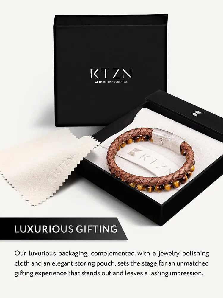 Brown braided leather bracelet with tiger eye stones and steel clasp in an rtzn artisan handcrafted gift box