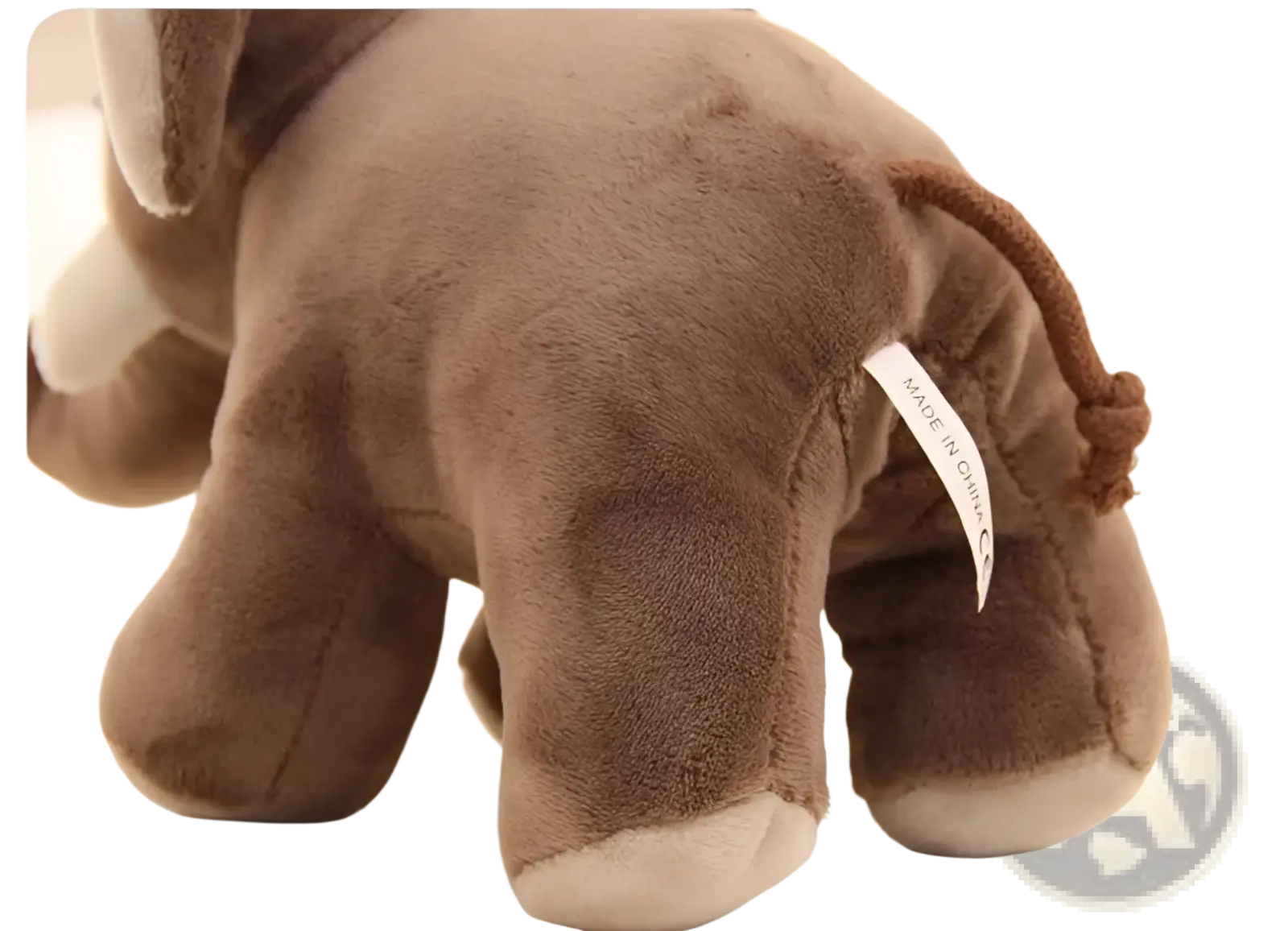 Brown elephant plush toy 25cm soft stuffed animal with textured fabric and white accents on feet