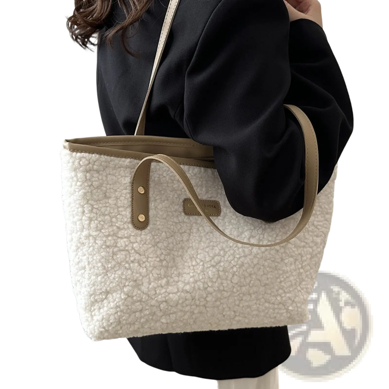 Cream-colored faux fur tote bag with tan leather handles and trim featured as brown faux fur tote bag with leather straps