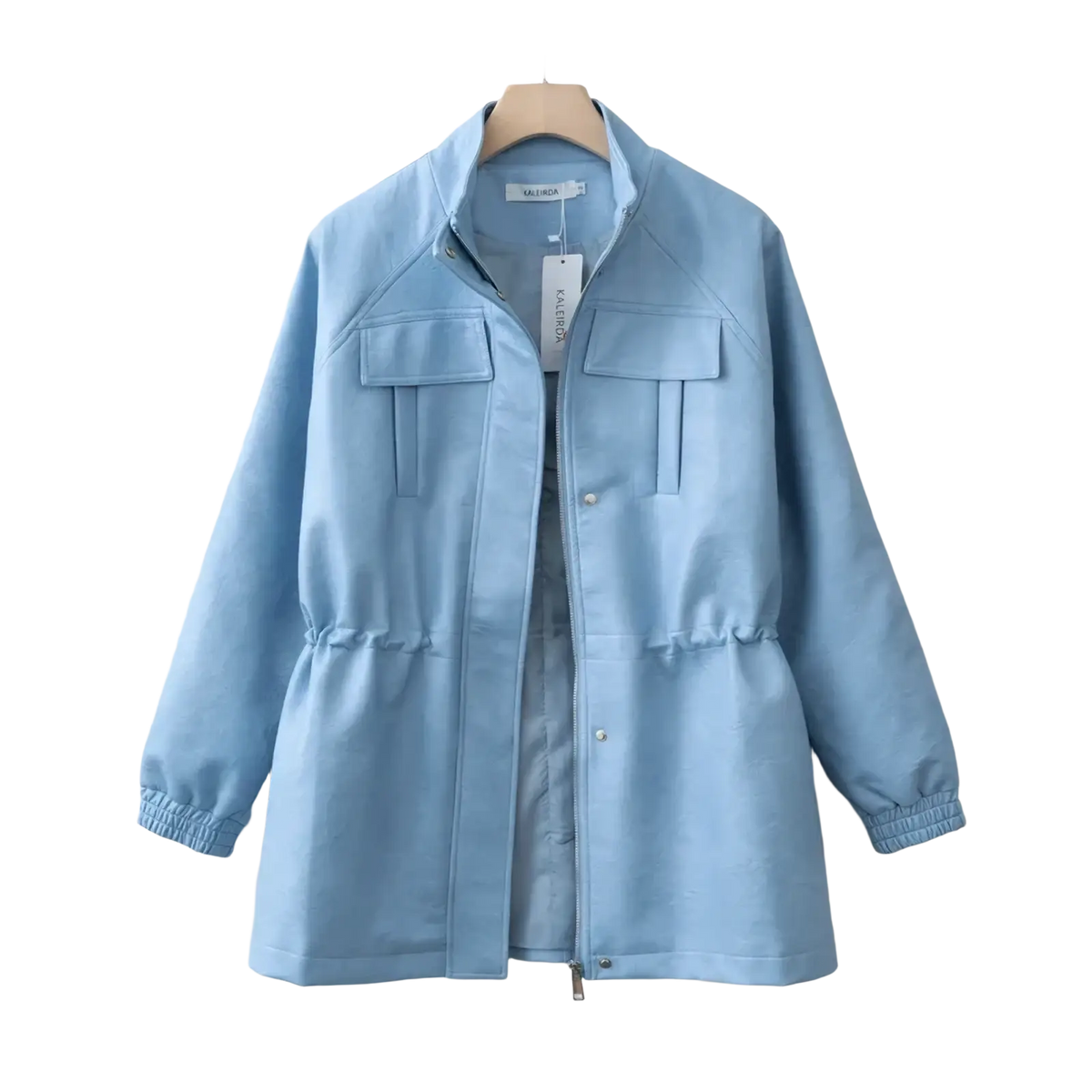 Light blue lightweight cotton jacket with two front pockets and elastic cuffs in a brown faux leather women autumn coat context