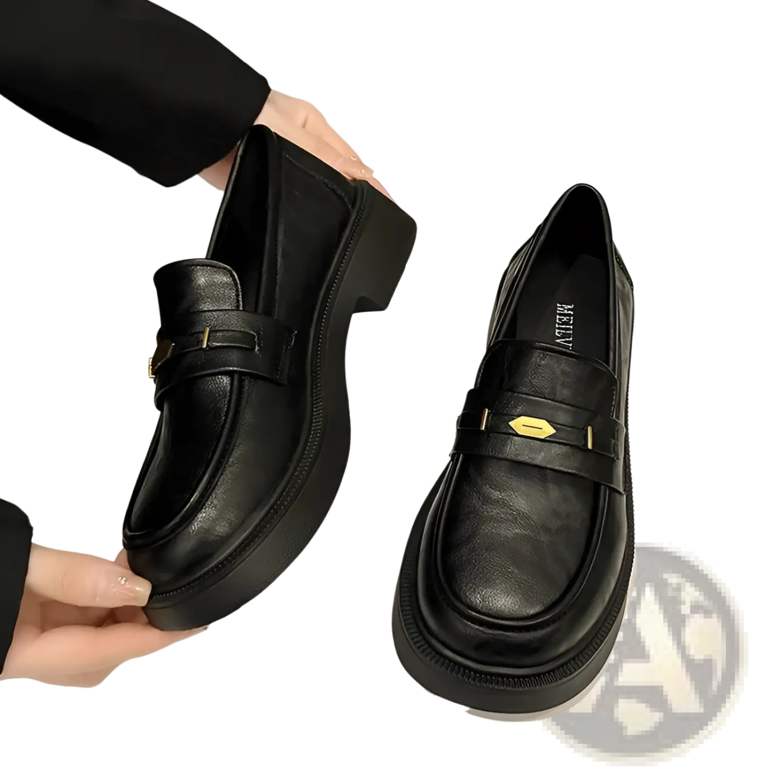 Black leather loafers with thick platform sole and gold tone metal buckle detail for stylish wear