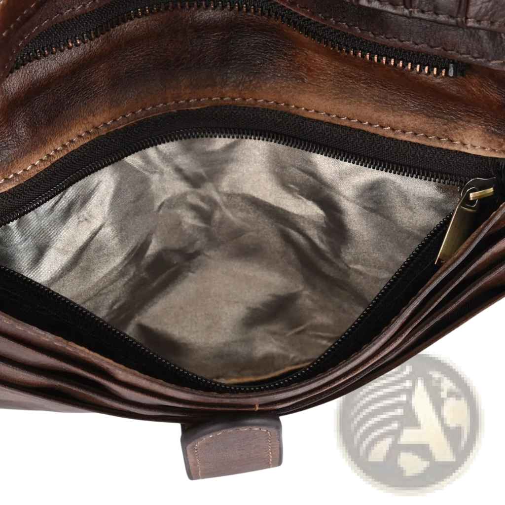 Brown leather long wallet with vintage stitching featuring a silver-lined interior and black zipper closure