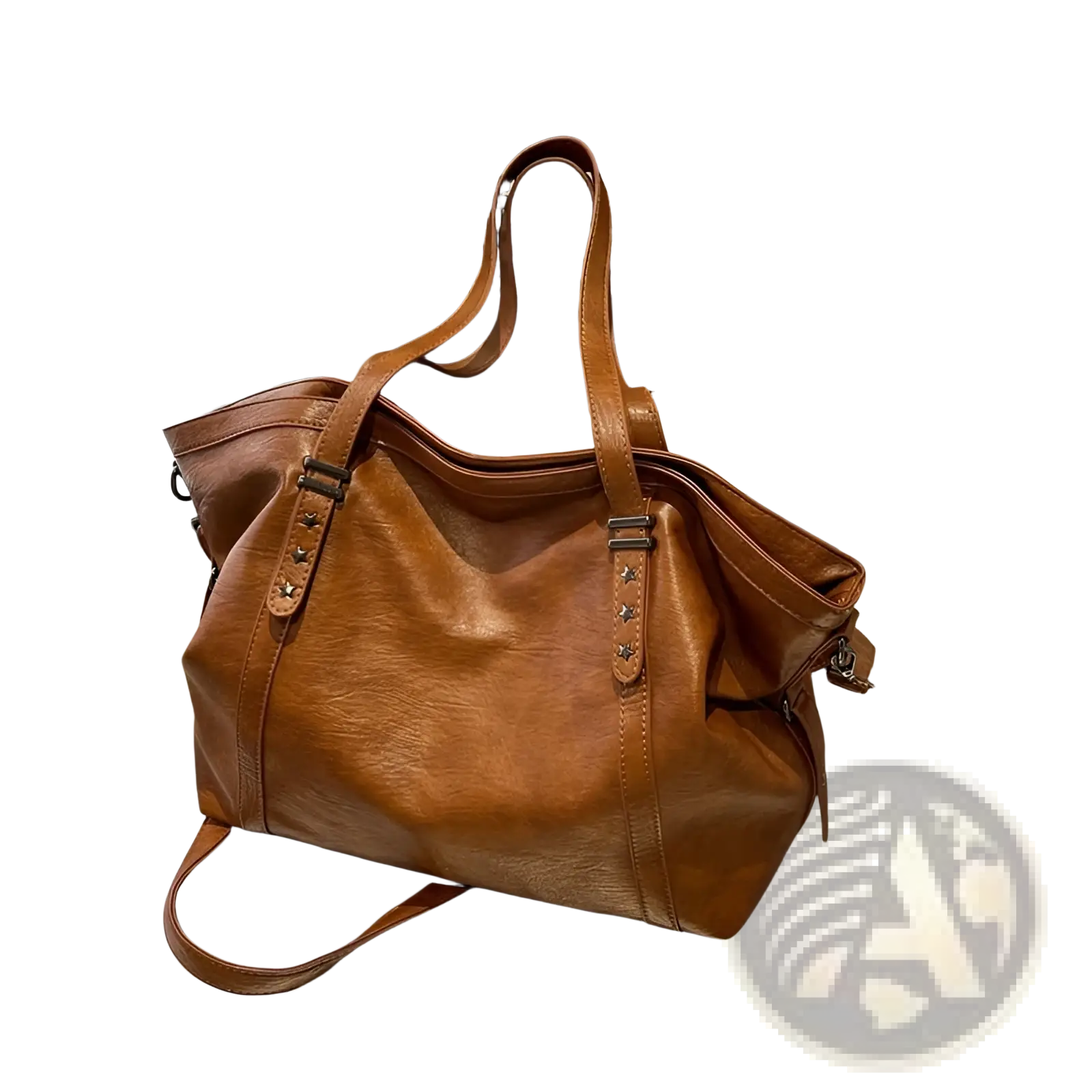 Brown leather tote bag with star studded hardware and detachable shoulder strap for versatile carry