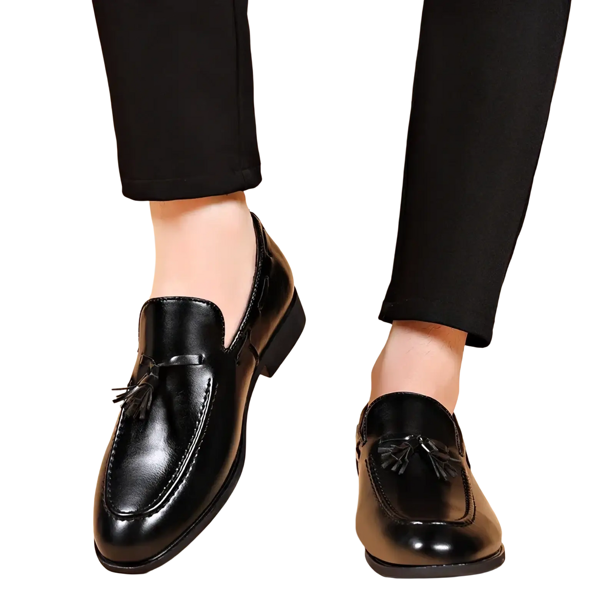 Black leather tassel loafers with polished finish and classic design for formal dress shoes