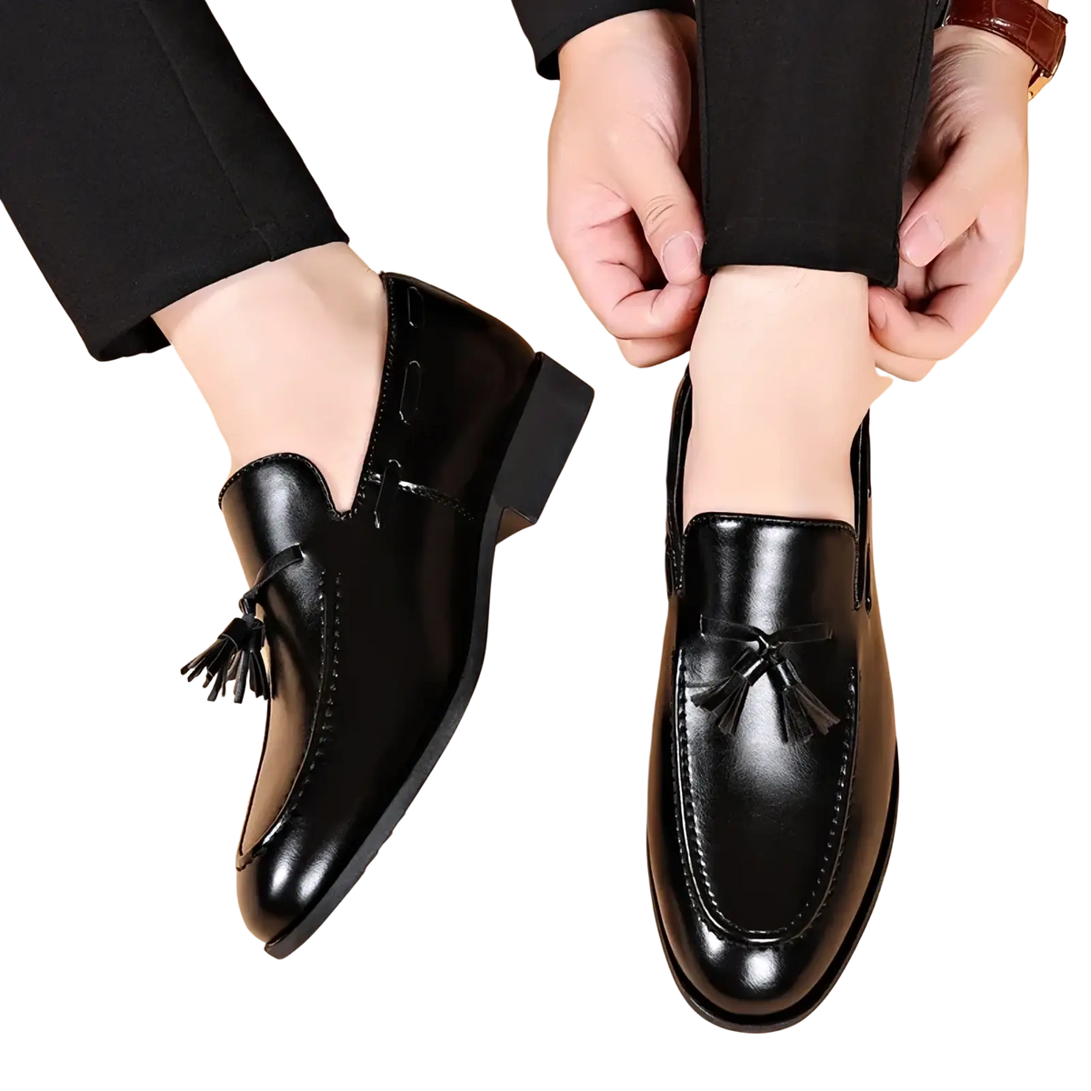 Black leather tassel loafers with a polished finish and classic design for formal dress occasions