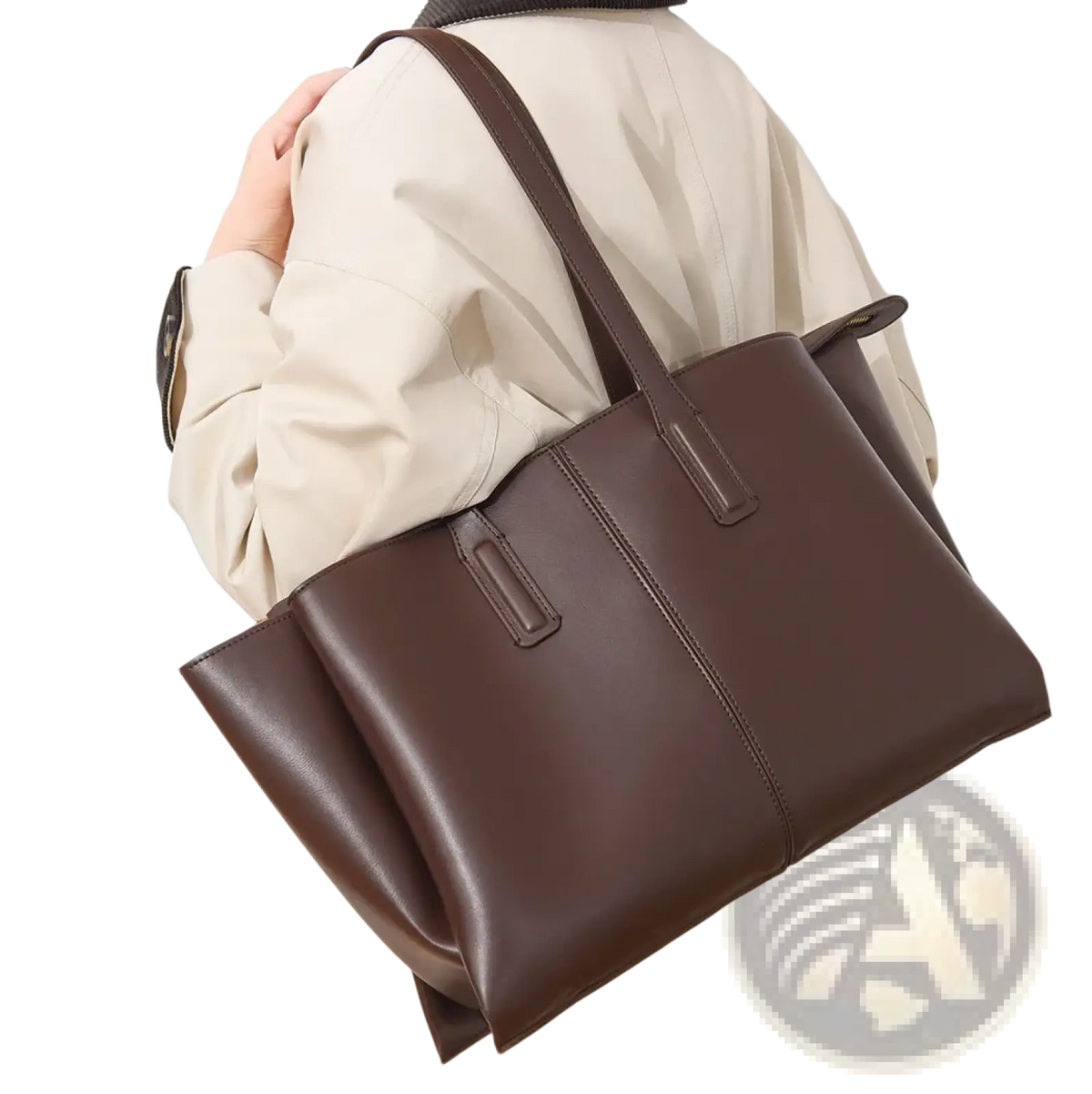 A sleek dark brown leather tote bag with large capacity structured handles and clean stitching for casual shopping