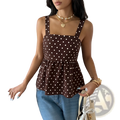 Brown polka dot peplum camisole with thin straps featuring a brown and white polka dot pattern and peplum detail