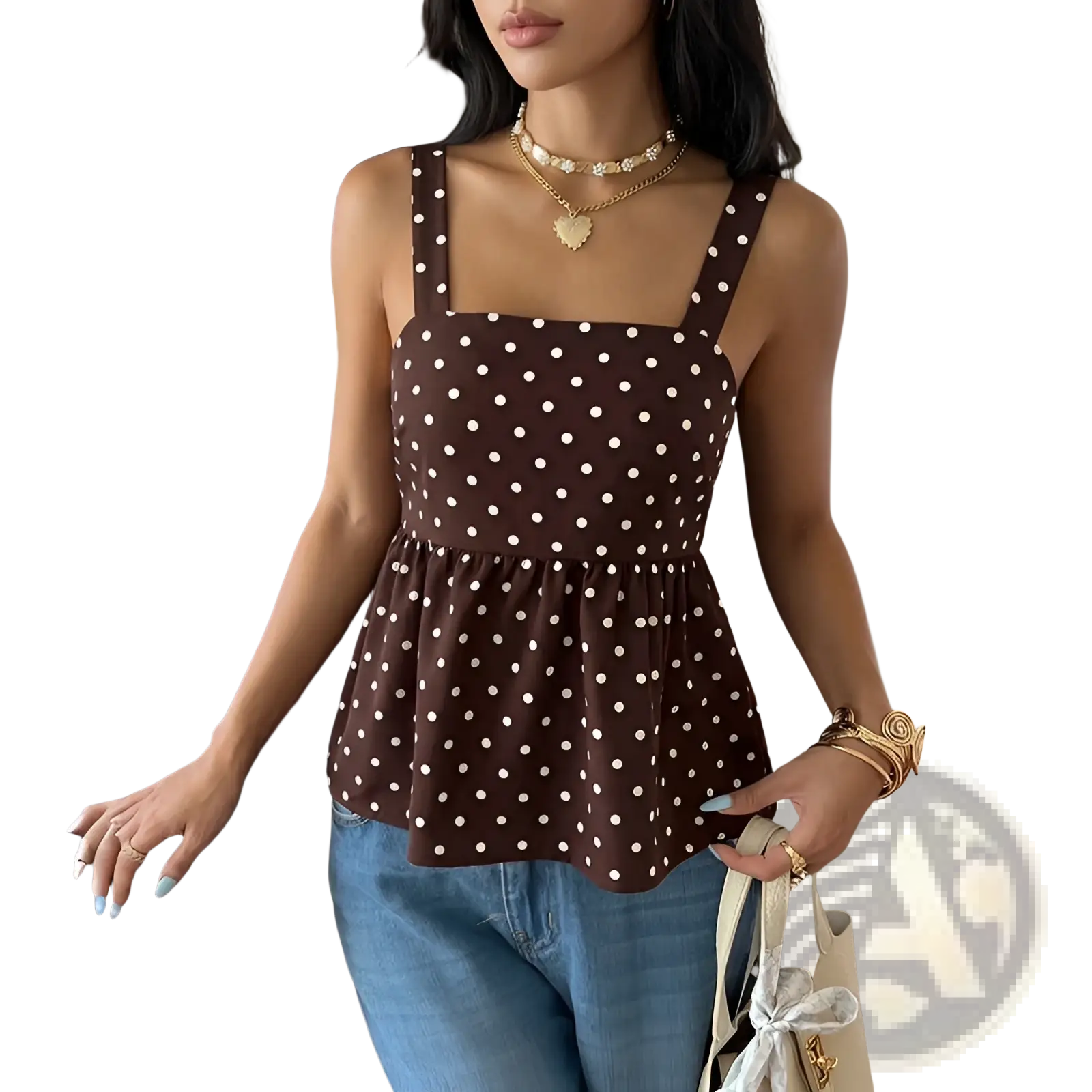 Brown polka dot peplum camisole with thin straps featuring a brown and white polka dot pattern and peplum detail