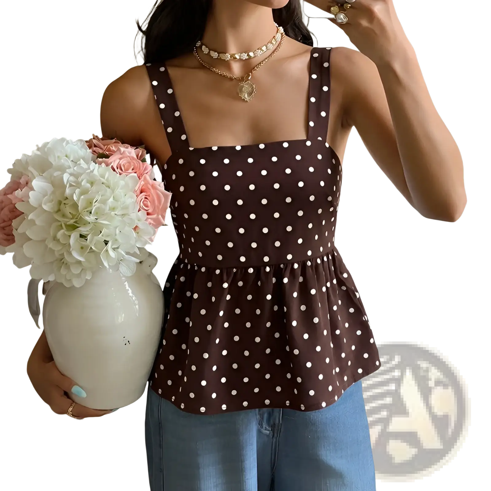 Brown polka dot peplum camisole with white dots and thin straps made of lightweight fabric for casual wear