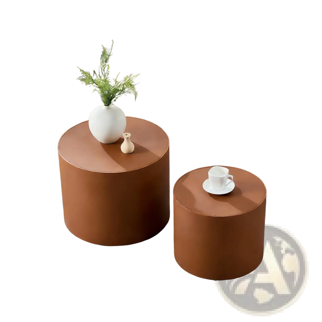 Brown saddle leather cylindrical coffee table set featuring smooth leather-like brown side tables