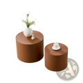 Brown saddle leather cylindrical coffee table set featuring smooth matte-finished side tables in brown tone