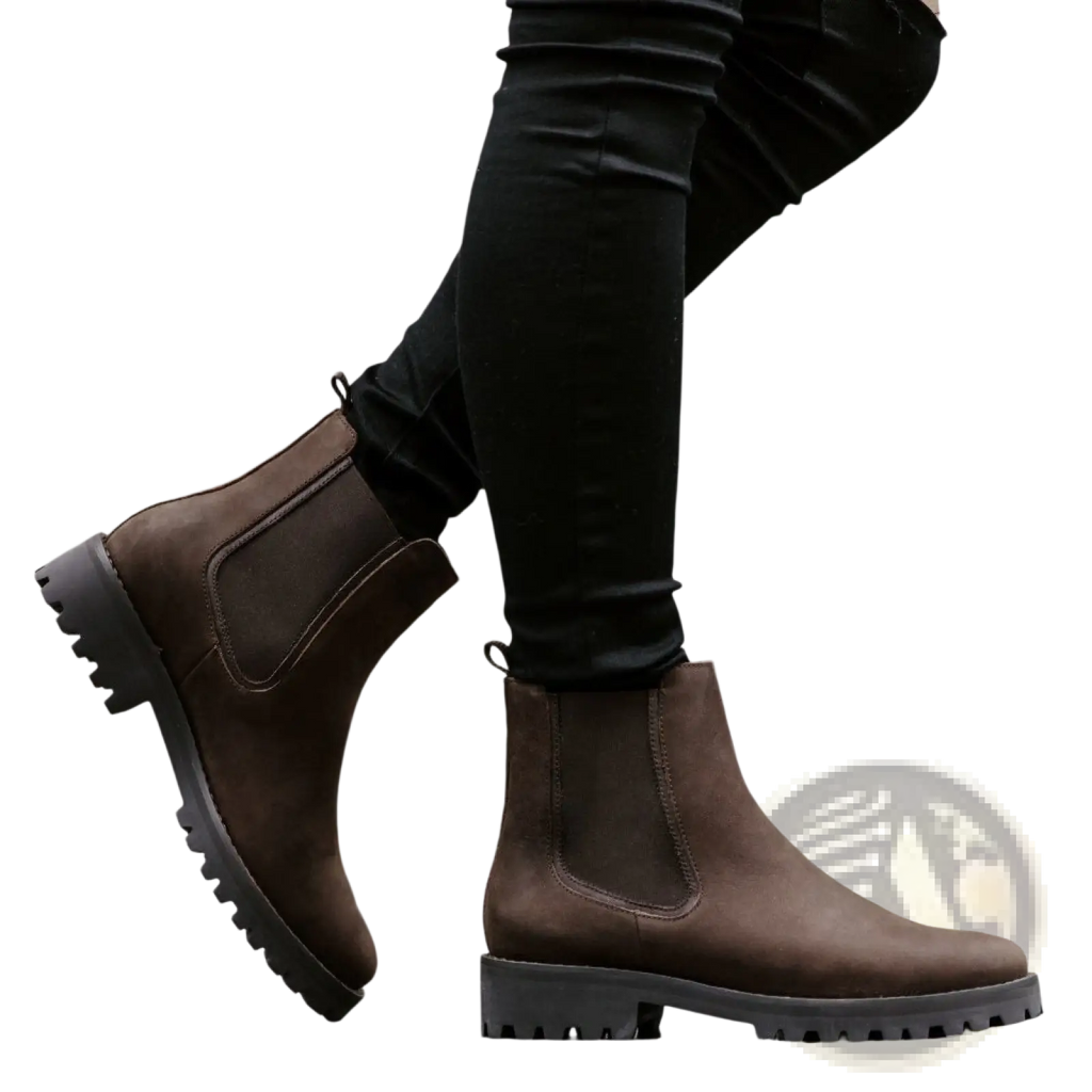 Brown suede Chelsea boots with a chunky black rubber platform sole for stylish and durable footwear