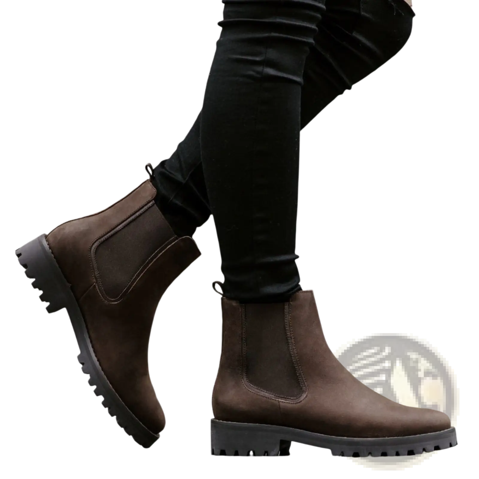 Brown suede Chelsea boots with a chunky black rubber platform sole for stylish and durable footwear