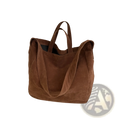 Brown suede tote bag with long handles featuring large corduroy shoulder design for versatile use