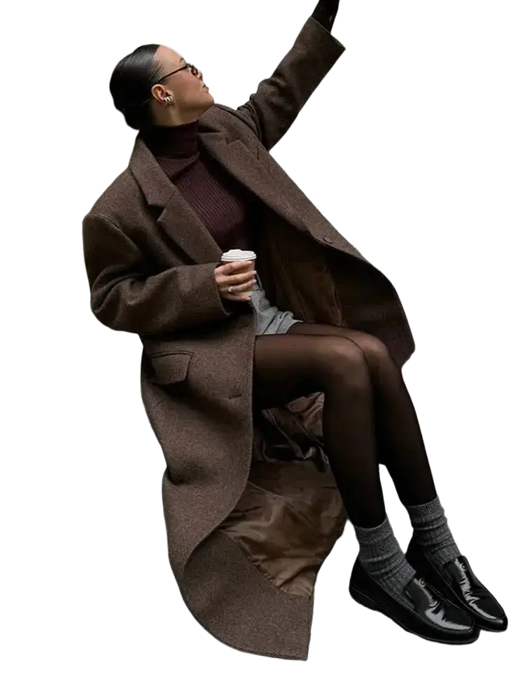 Brown wool blend overcoat for women with a classic double-breasted design and notched lapels perfect for winter commuters