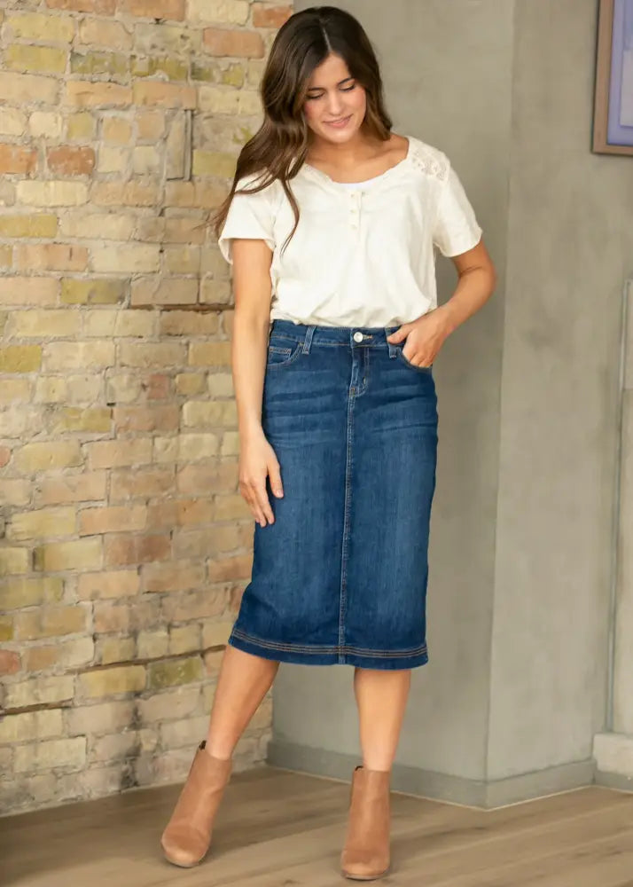 Bryn dark wash straight denim midi skirt in mid-thigh length with subtle stitching details