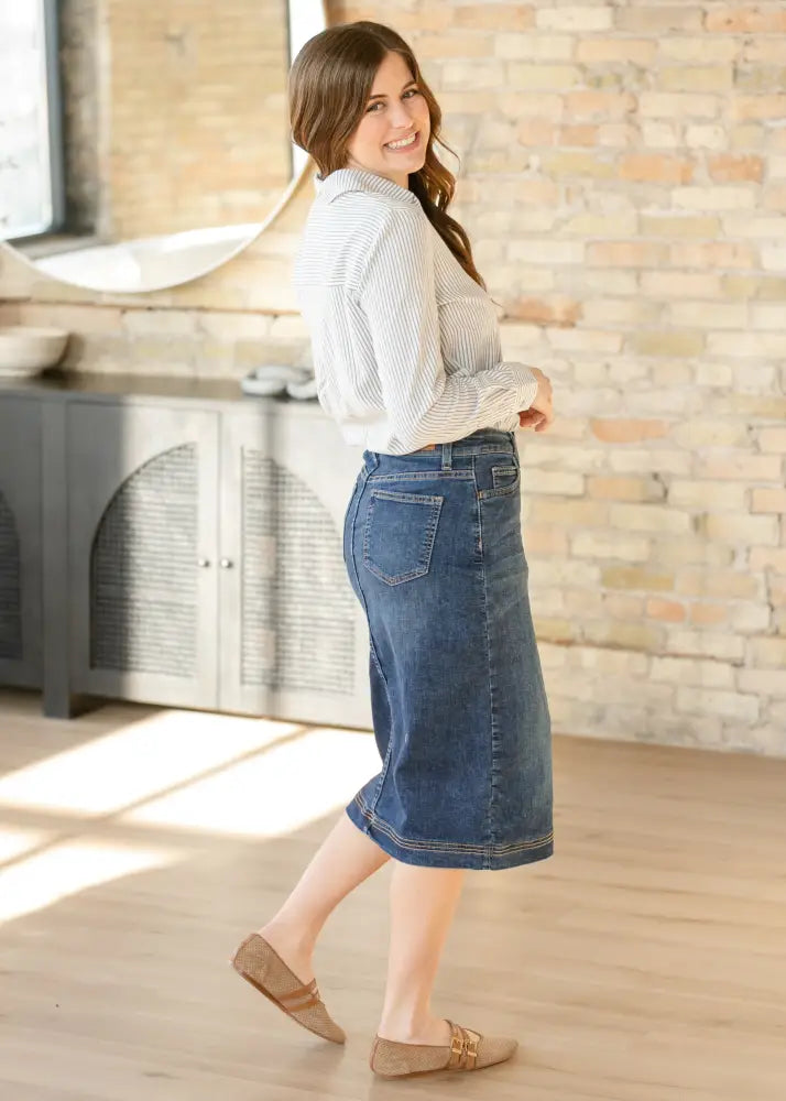 Bryn dark wash straight denim midi skirt with mid-thigh length and visible stitching details