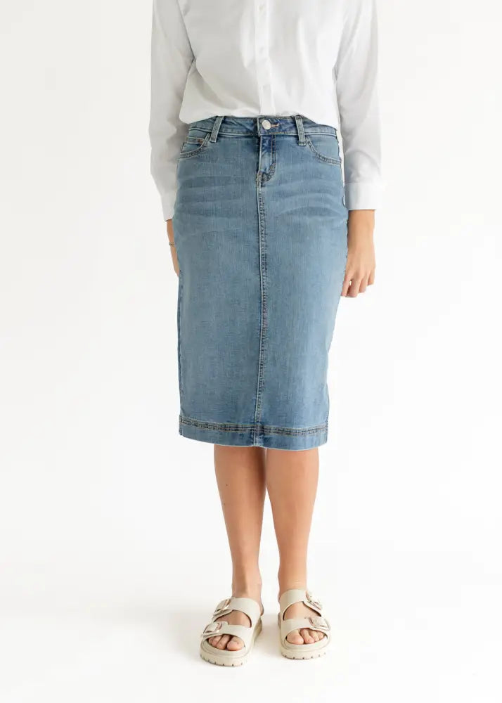 Bryn light wash sustainable denim midi skirt in light wash with classic straight cut and visible hem stitching