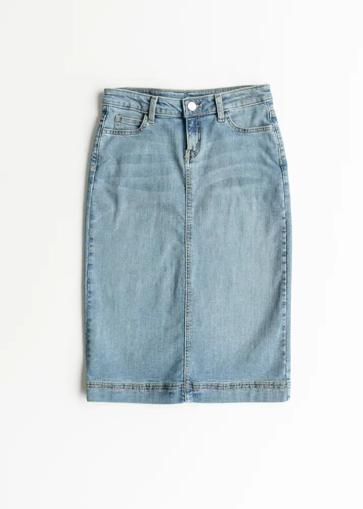 Bryn light wash sustainable denim midi skirt featuring a button closure and front pockets in light wash denim
