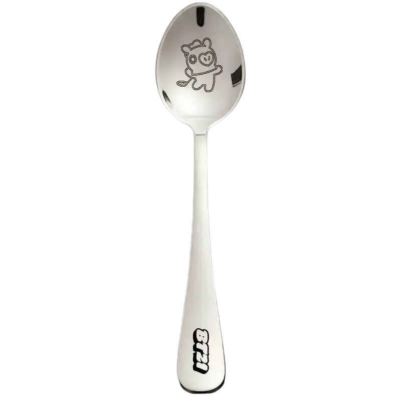 Bt21 stainless steel dessert spoon featuring a shiny silver finish with a cartoon character engraving and bt21 print near base