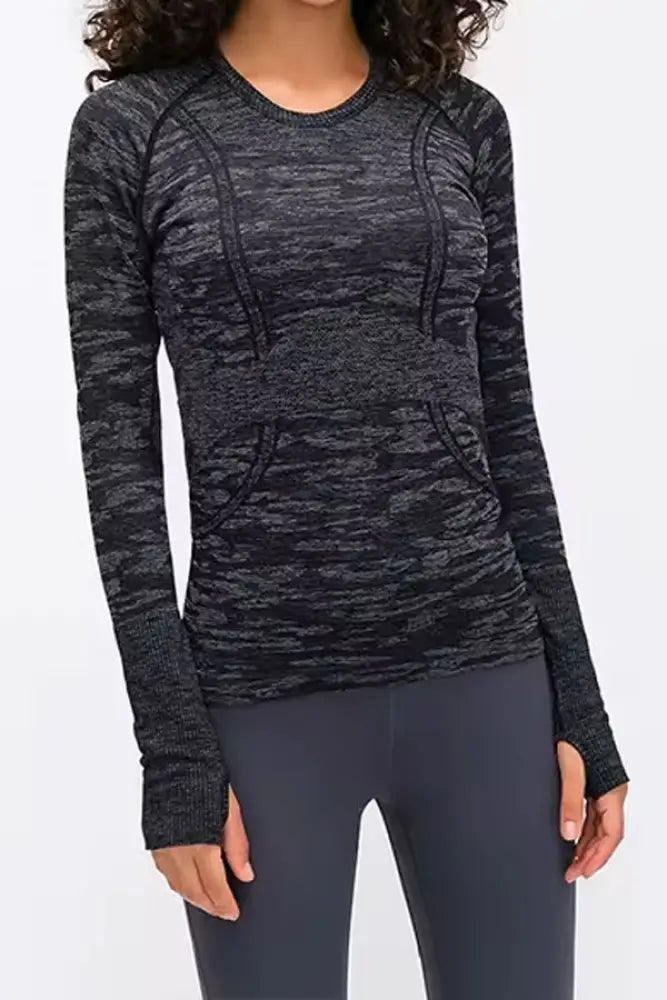 Black and gray marled seamless long-sleeved athletic top with upf 30 sun protection and front pockets by btr active