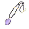 Elegant purple buddha pendant necklace with faceted amethyst and gold-tone accents, suitable for all applicable age groups