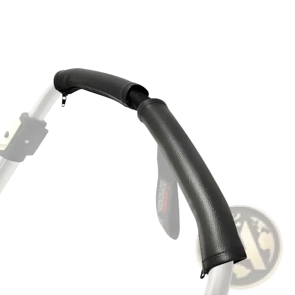 Black faux leather Bugaboo Bee stroller handle cover with textured surface and reinforced stitching
