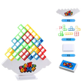 Colorful plastic building block bricks stacked in a pyramid shape on a white base in a building block balance tetra tower game set