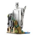 Gray building block model of king sauron statue with detailed robes and rocky base featuring trees and water