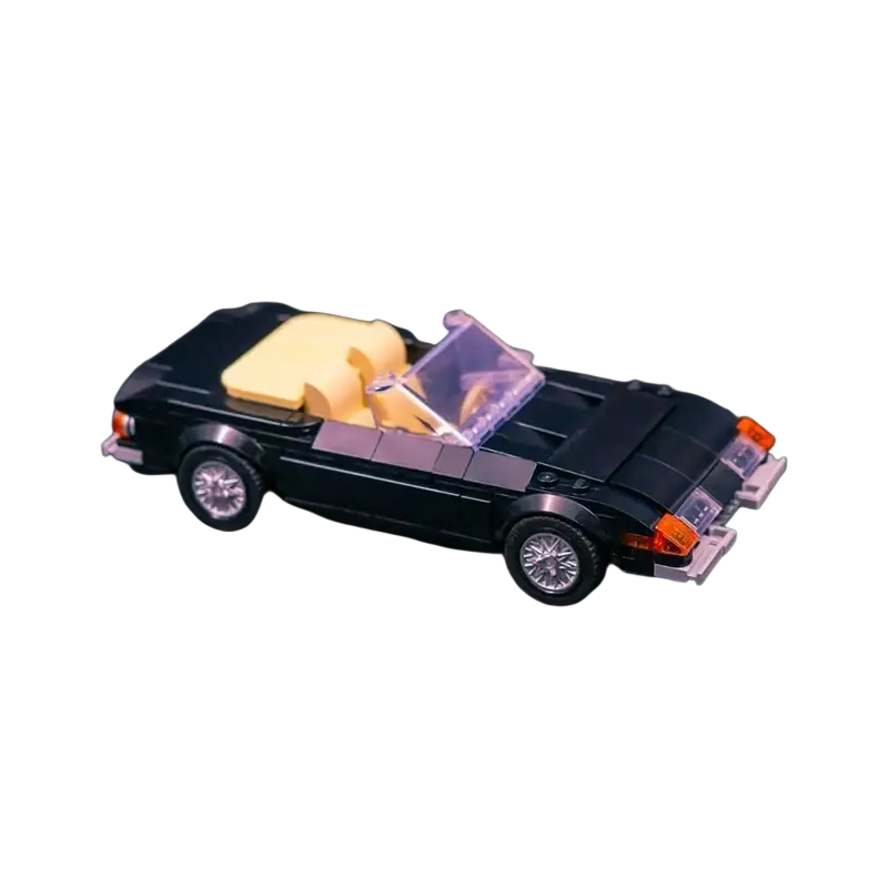 Black convertible lego sports car model with yellow seats clear plastic top and printed parts compatible with 677 blocks