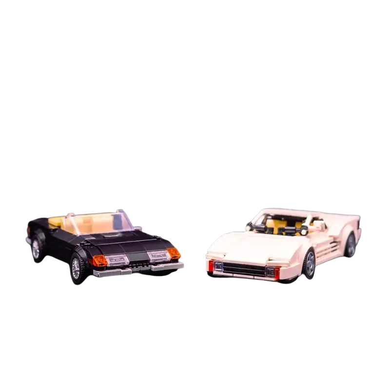 Black and white lego compatible sports car model with yellow interiors featuring printed parts and 677 building blocks