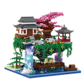 Detailed asian-themed building block toys featuring a pagoda with gray roofs red accents cherry blossoms and waterfalls