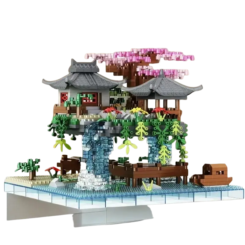 Building block toys showcasing a chinese garden waterfall pavilion with gray roofs green foliage pink blossoms and blue waterfall