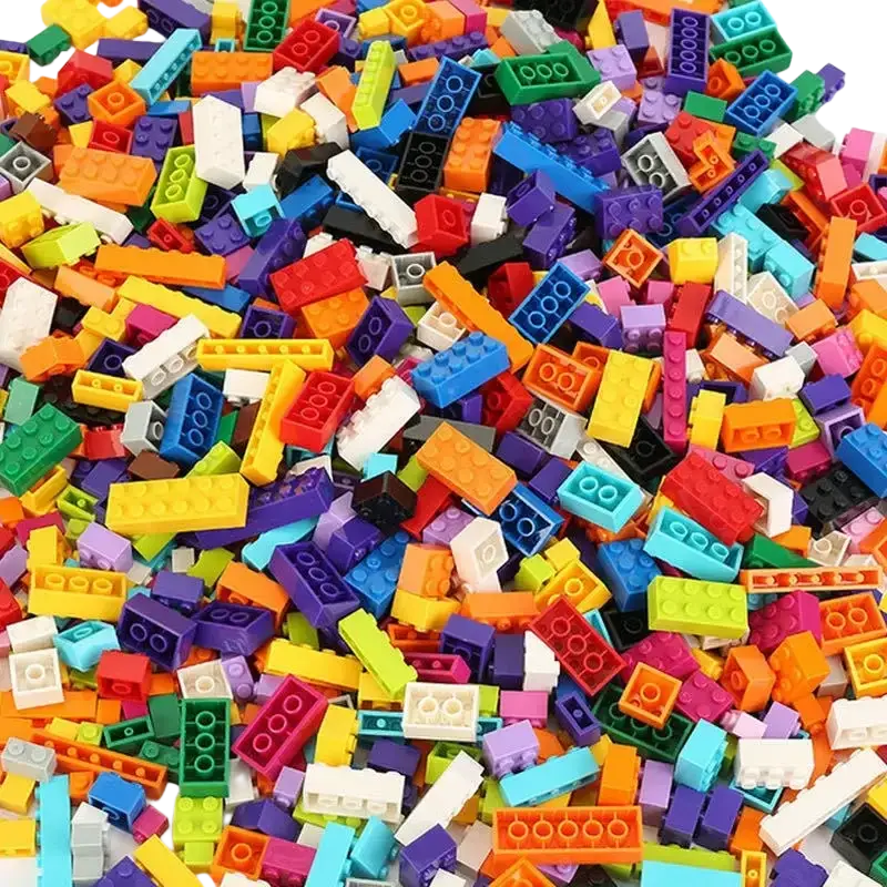 A vibrant assortment of colorful plastic diy creative building blocks in various shapes and sizes 1000 pcs set