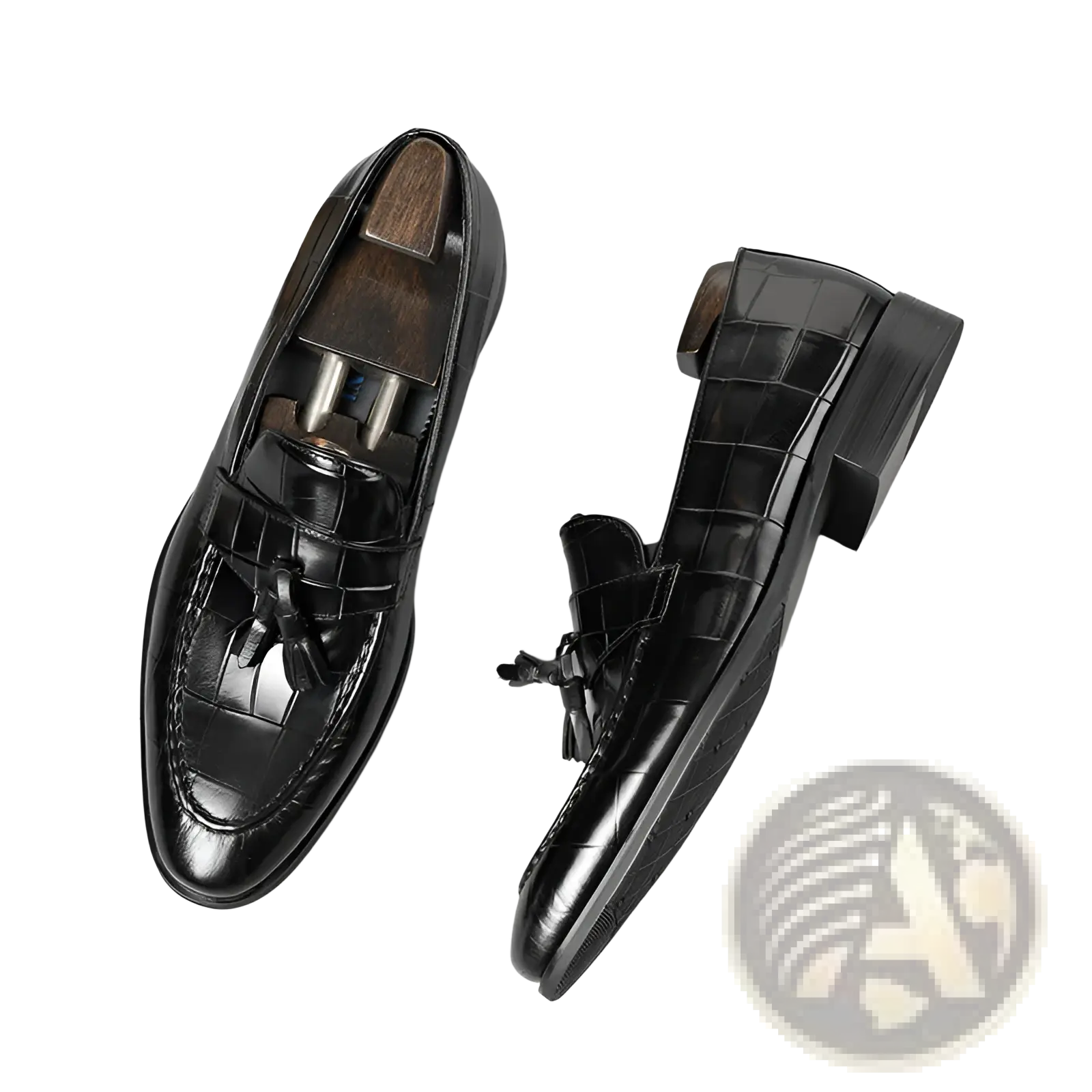 Black crocodile embossed leather tassel loafers with a glossy finish and low block heel for formal wear