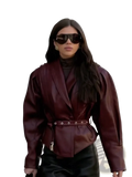 A structured burgundy faux leather belted blazer featuring puffed sleeves for a stylish and polished look