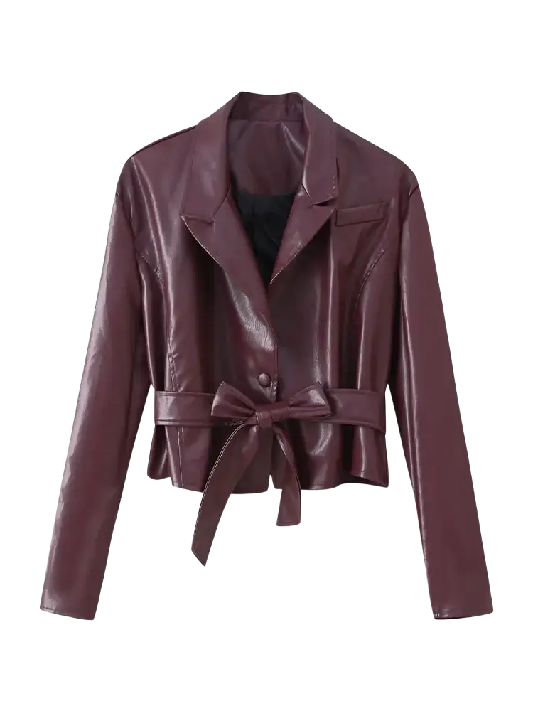 A sleek burgundy faux leather belted cropped blazer with a structured collar and bow tied at the waist