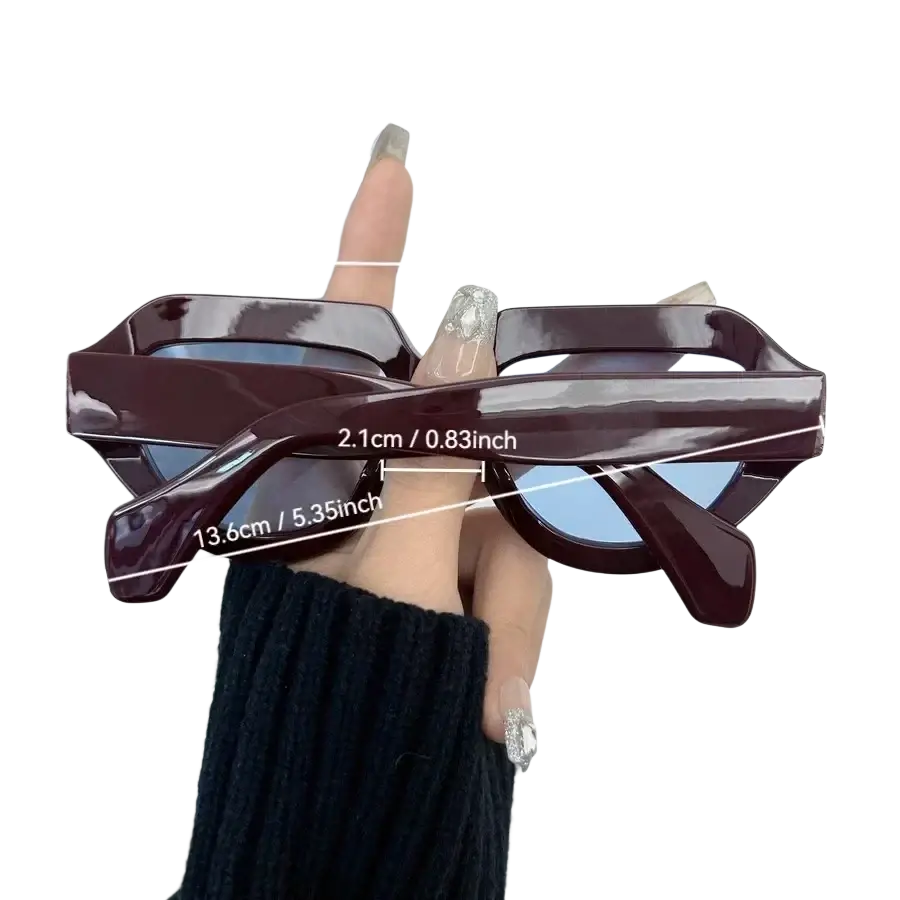 Burgundy geometric sunglasses for women and men with glossy acetate frame and blue mirrored lenses in a modern angular design