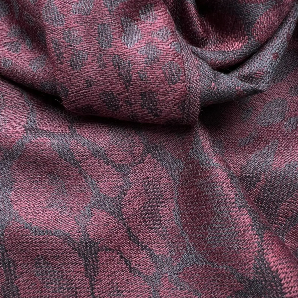 Burgundy jacquard long winter scarf with rich burgundy and dark gray woven fabric featuring an intricate geometric design