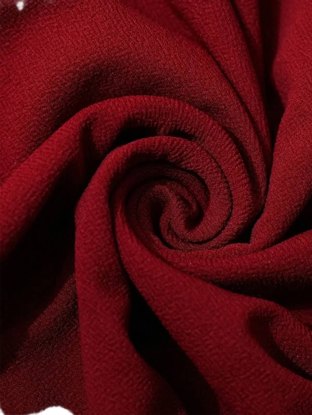 Burgundy lace formal dress featuring deep red soft textured fabric with a subtle ribbed weave detail