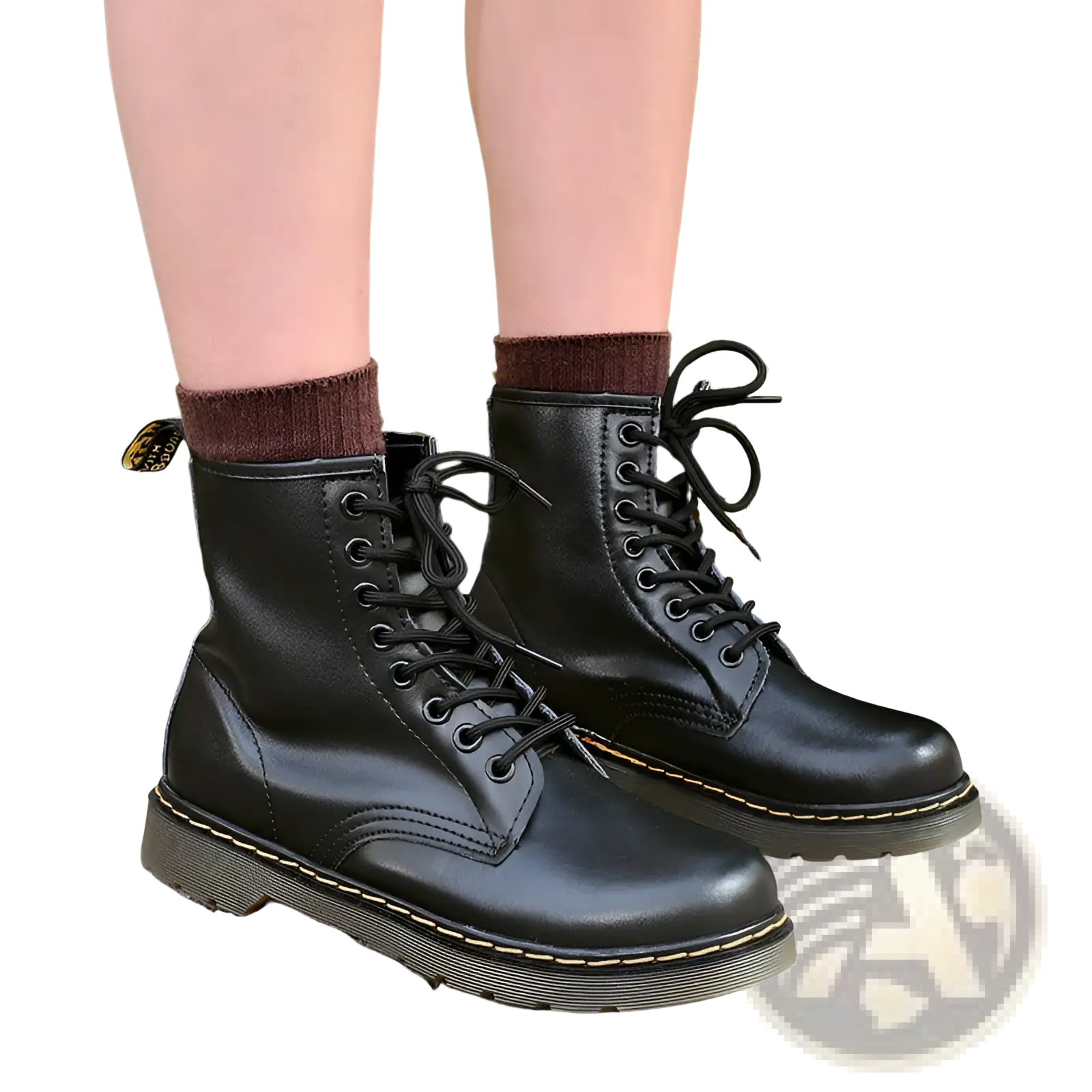 Black leather dr martin boots featuring yellow stitching and a burgundy sole shown from the back side