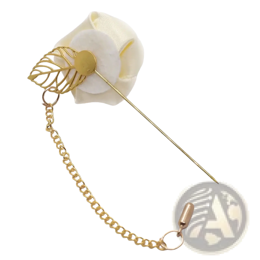 Burgundy rose boutonniere featuring a cream fabric flower with gold leaf pin and attached gold chain clasp