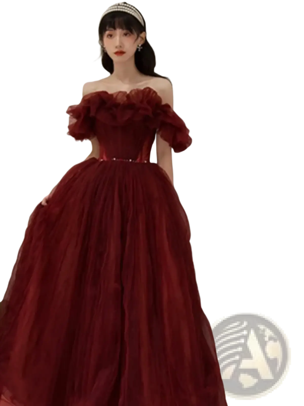A deep red off the shoulder ball gown featuring a ruffled bodice and voluminous tulle skirt for prom
