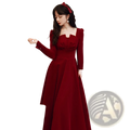 Burgundy velvet long sleeve a-line gown with square neckline fitted bodice and flared skirt for formal occasions