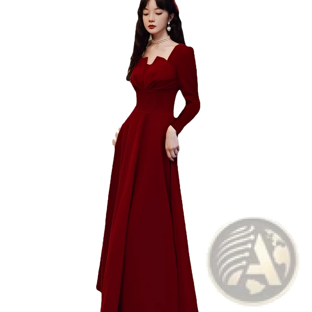 A rich burgundy velvet long sleeve a-line gown with floor-length design and square neckline