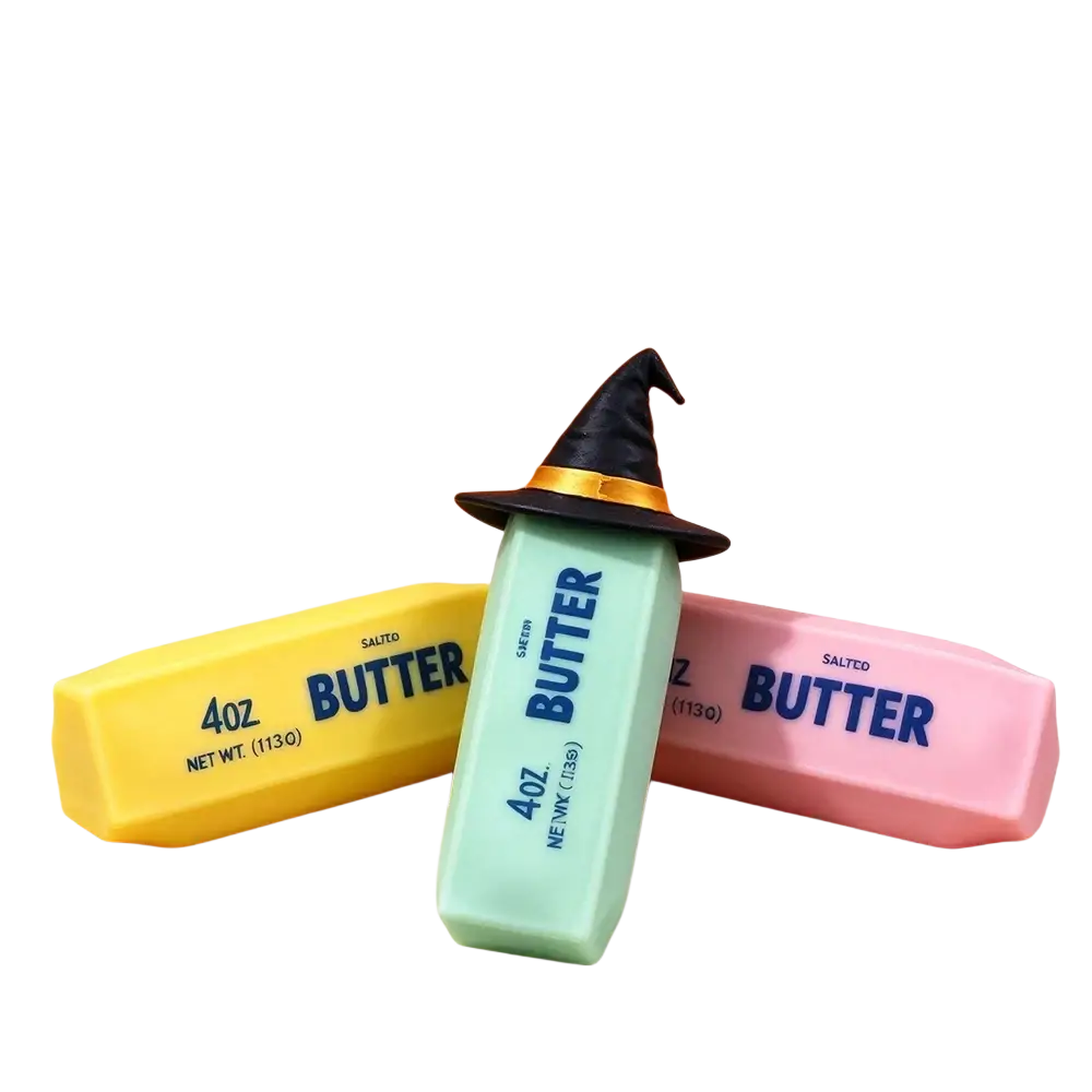 Butter bar sensory fidget toy featuring a mint green witch hat-shaped butter block topped with a black and gold hat