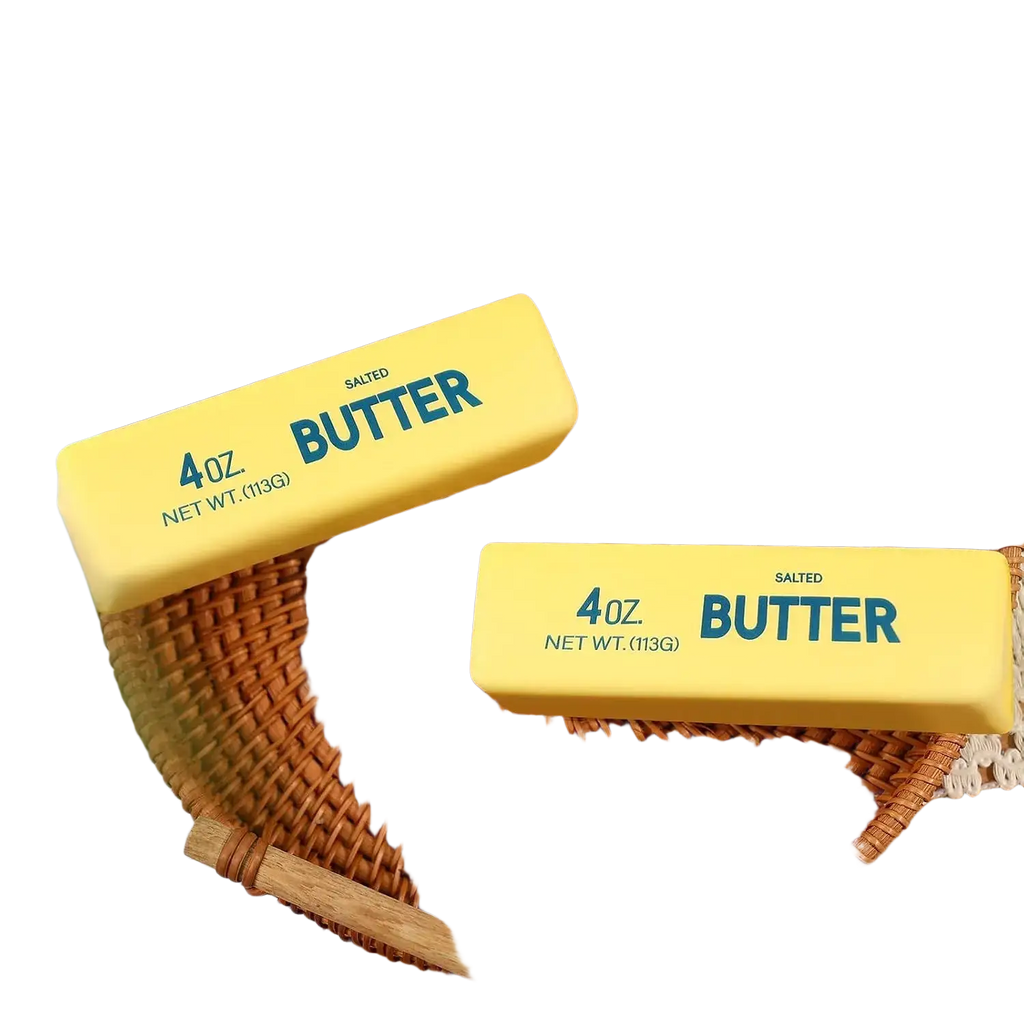 Two yellow butter slow rising 4 oz salted butter stick squishy fidget toys for stress relief and sensory play