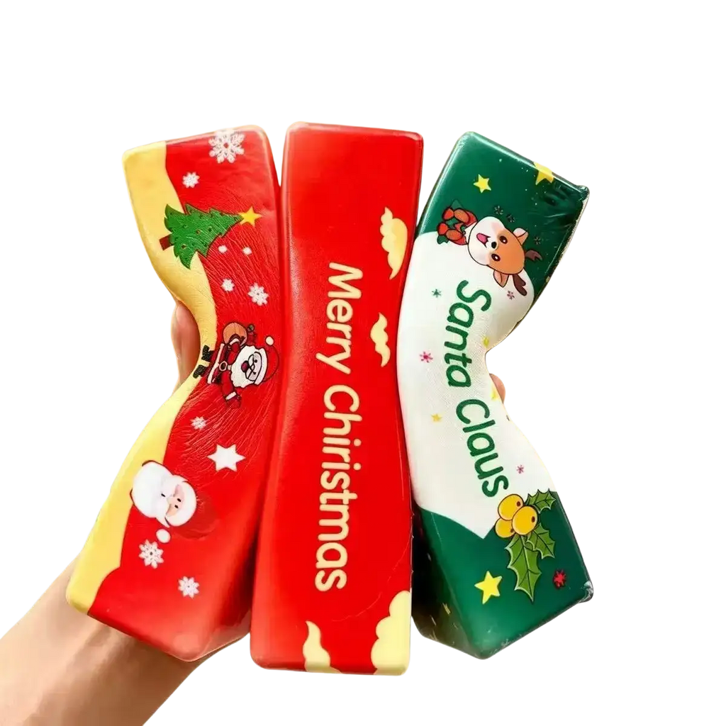 Three festive red and green butter squishy toy christmas slow rising silicone stress relief toys with santa and snowflakes designs