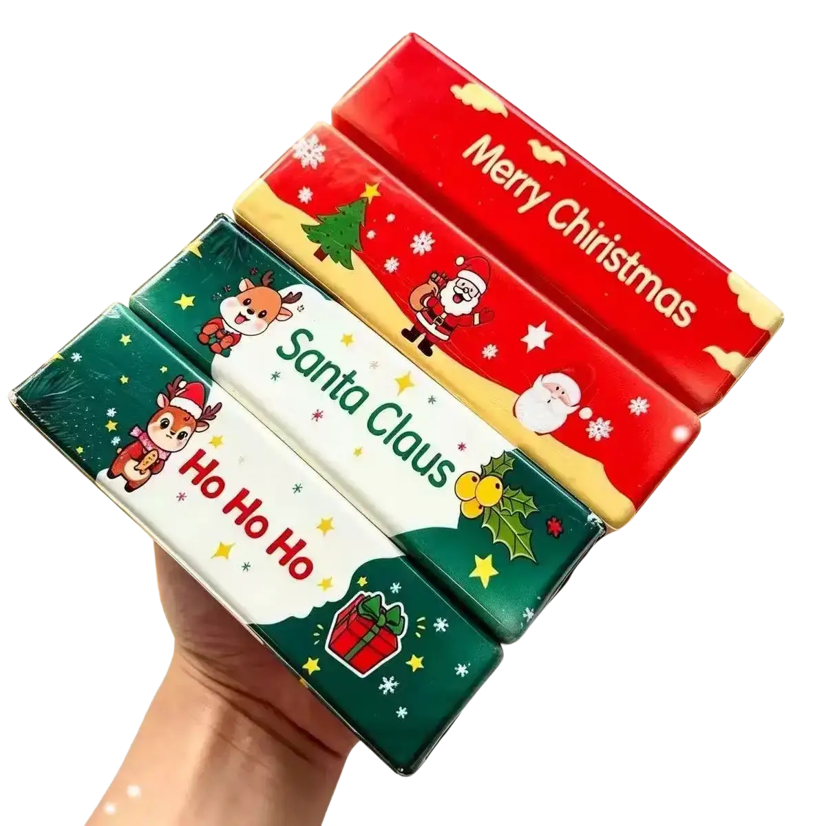 Three colorful christmas-themed butter squishy toy tissue boxes with santa claus and reindeer slow rising design