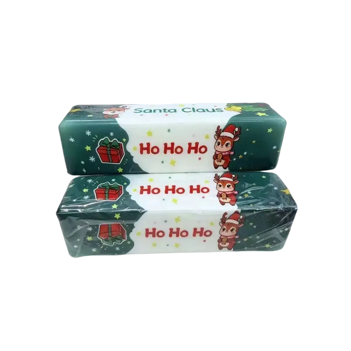Two festive green and white christmas-themed butter squishy toy slow rising soap bars with reindeer and ho ho ho text